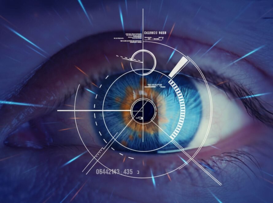 A close-up of a blue and orange human eye overlaid with a futuristic, glowing digital targeting HUD.
