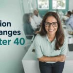 Smiling woman wearing glasses in an office, highlighting common vision changes after age 40.